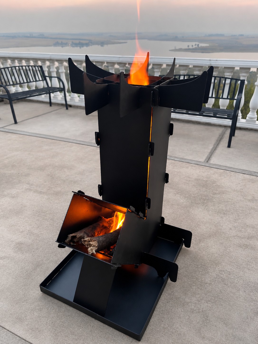 Phala Rocket Stove burning outdoors